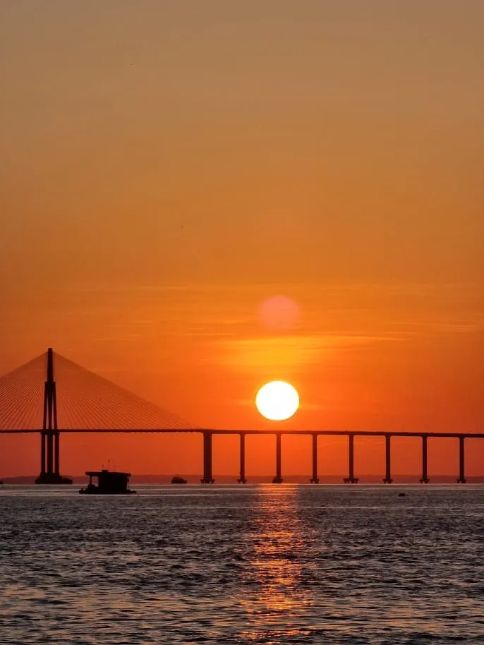 Sunset behind the Rio Negro bridge in Manaus