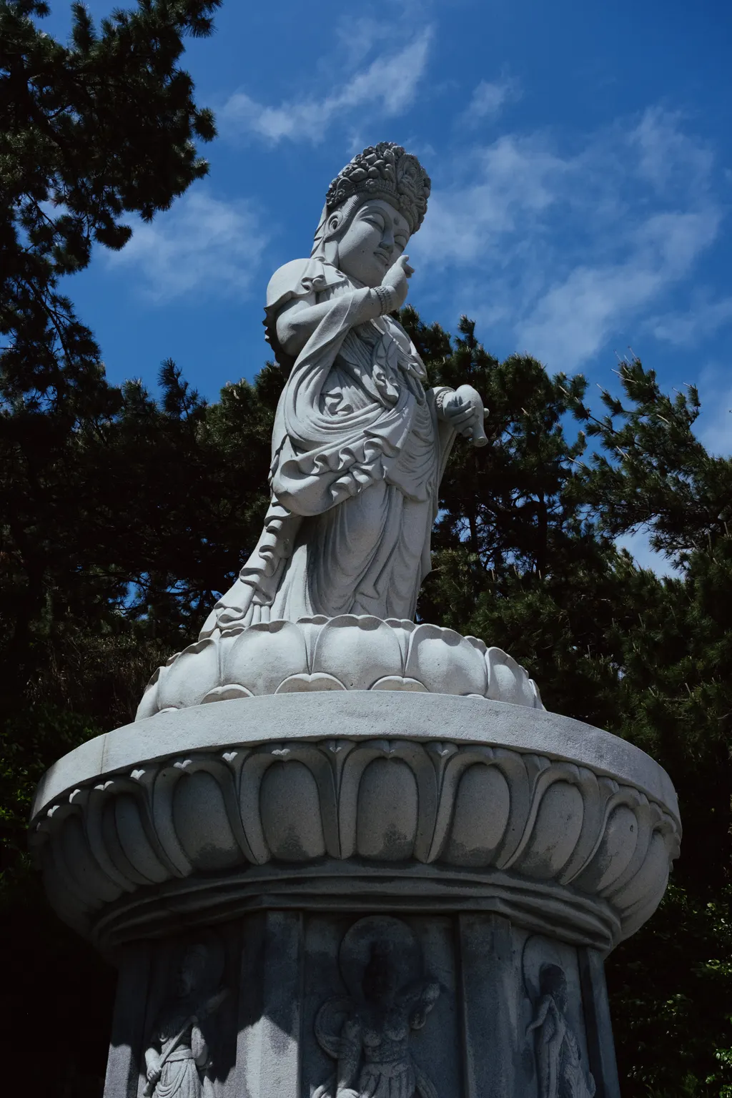 The Haesu Gwaneum Daebul, the Seawater Great Goddess Buddha, on her lotus pedestal at Haedong Yonggungsa temple