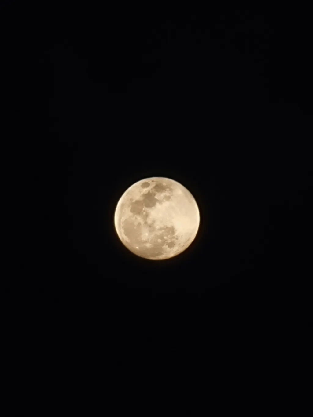 Waxing gibbous moon, craters visible along the terminator